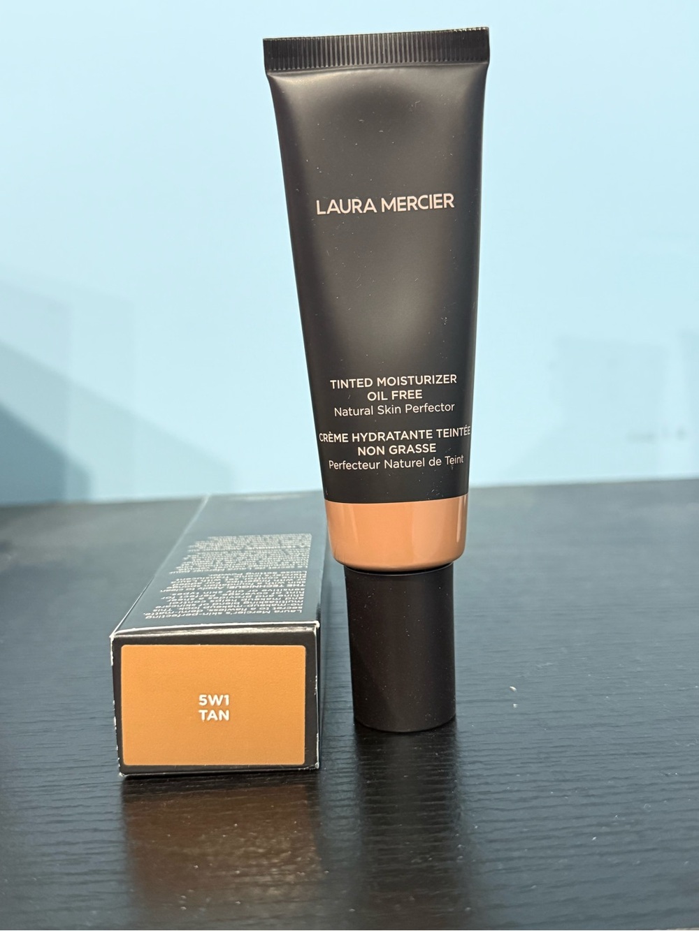 laura mercier Tinted Moisturizer Oil Free in Tan (5W1) - Warm Tan Shade